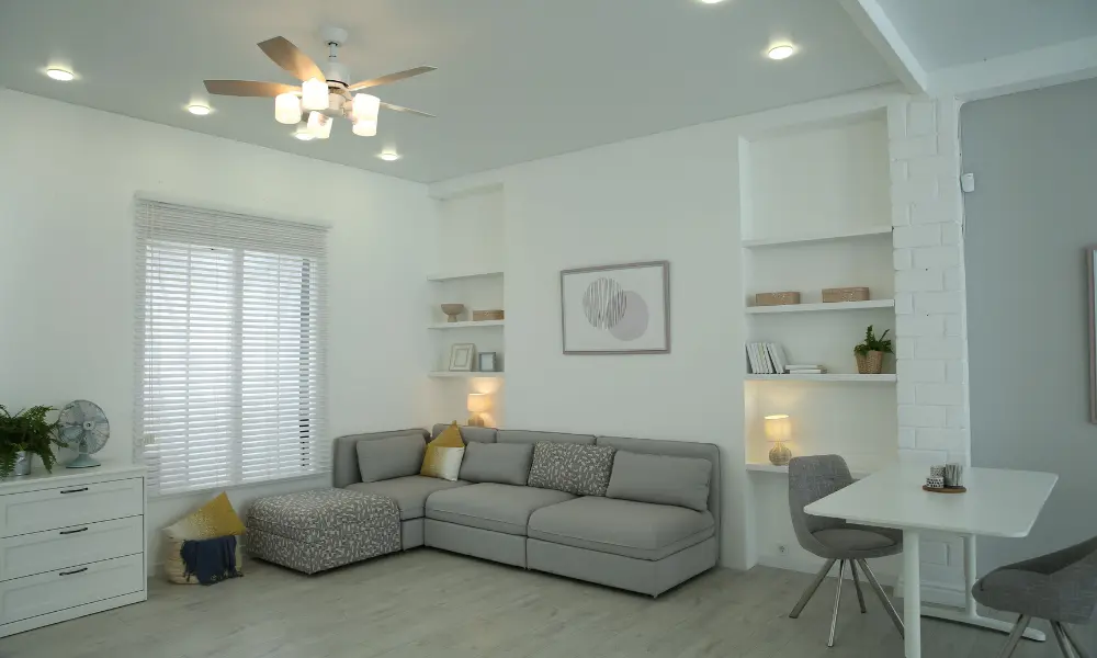 minimalist living room with multifunctional furniture and optimized layout