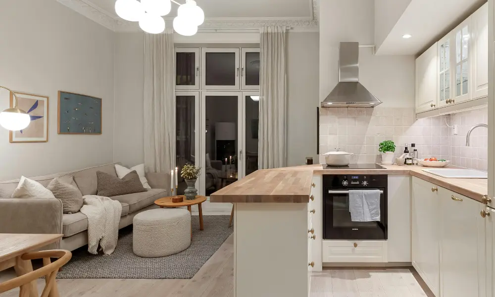 Integrated living room and kitchen with minimalist interior design for small spaces