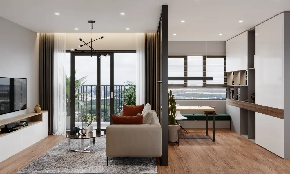 Integrated living and dining room with sofa, elegant divider, and functional cabinetry in a minimalist apartment